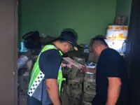 Over one tonne of subsidised cooking oil seized from house in Sandakan
