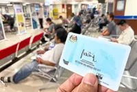 QuickCheck: Will MyKad photographs be replaced with a QR code?