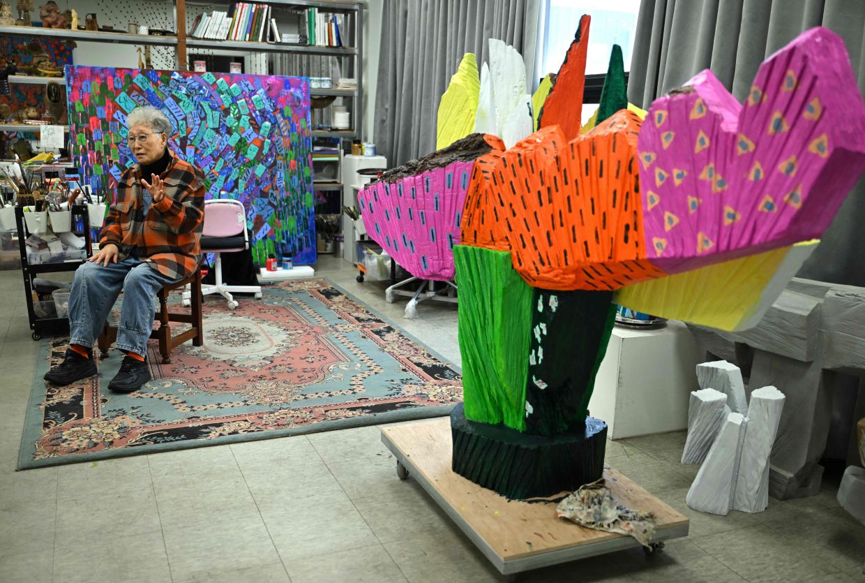 Kim Yun Shin sharing her artistic viewpoints during an interview at her studio in Paju. Photo: AFP 