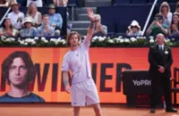 Tennis-Rublev sets up Barcelona final showdown with Fils