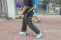 Robotic legs help elderly fire survivors climb home