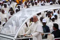 Pope urges Angola to overcome divisions at Mass attended by 100,000 people