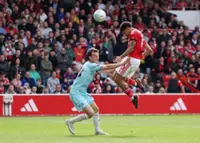 Soccer-Forest pull clear of relegation with Gibbs-White hat-trick against Burnley