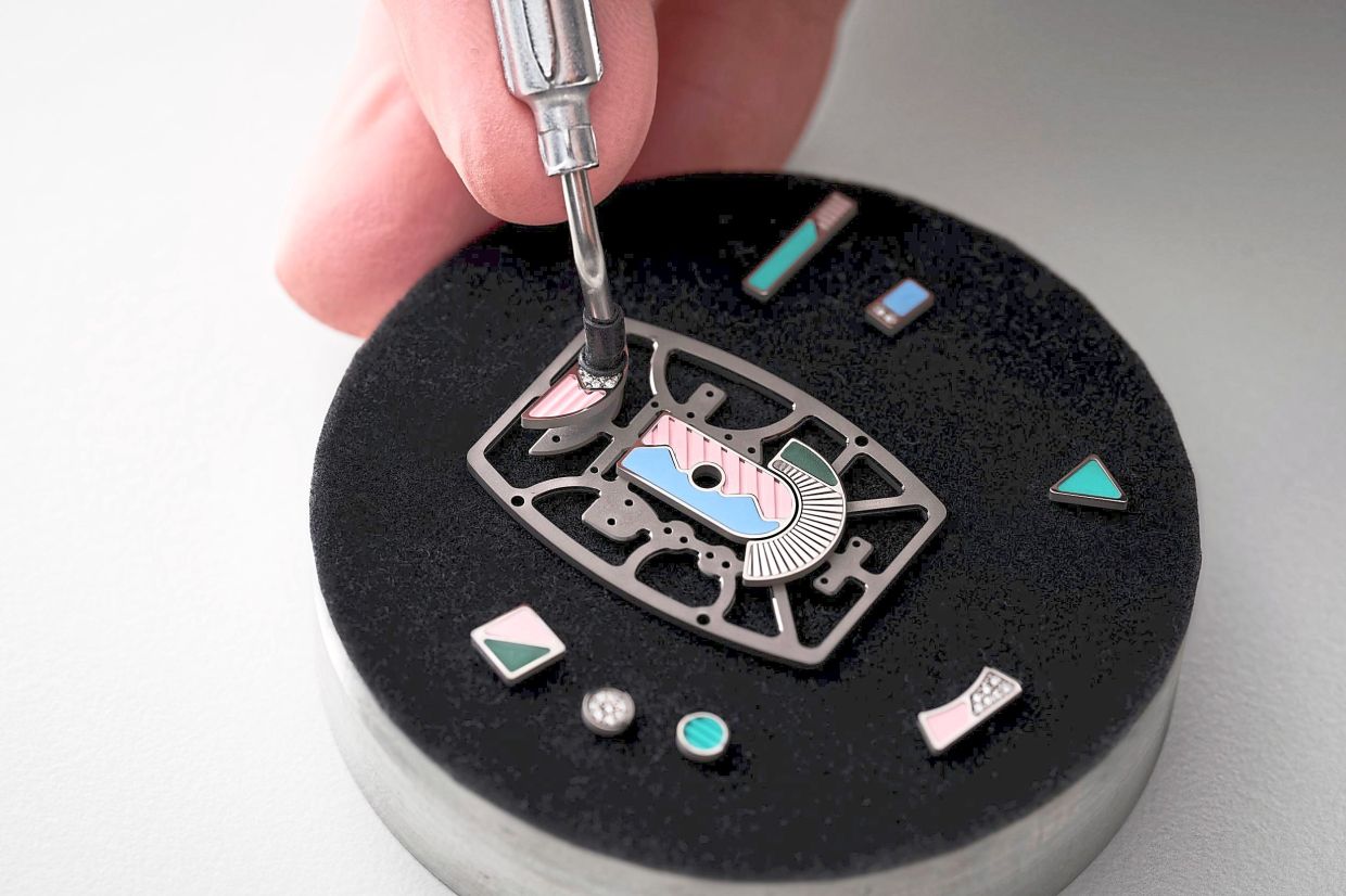 The dials are constructed through a complex layering of materials.