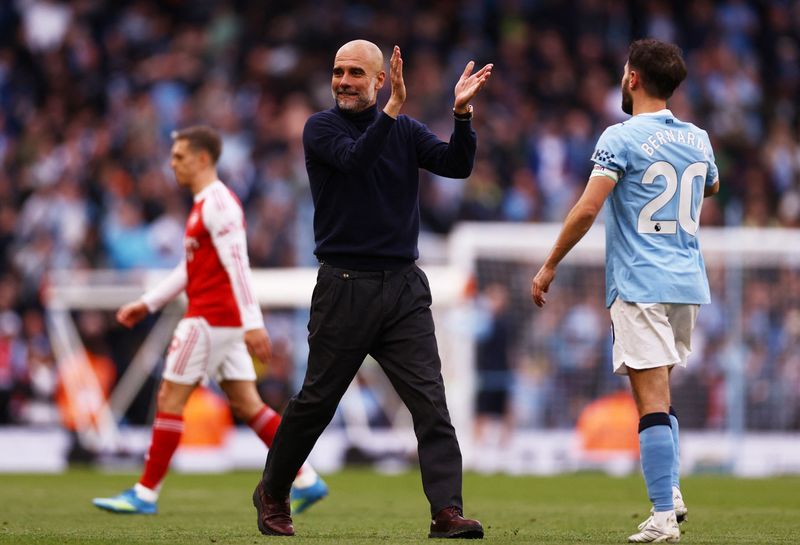 Soccer-Guardiola says Arsenal still in control, but victory gives them ...