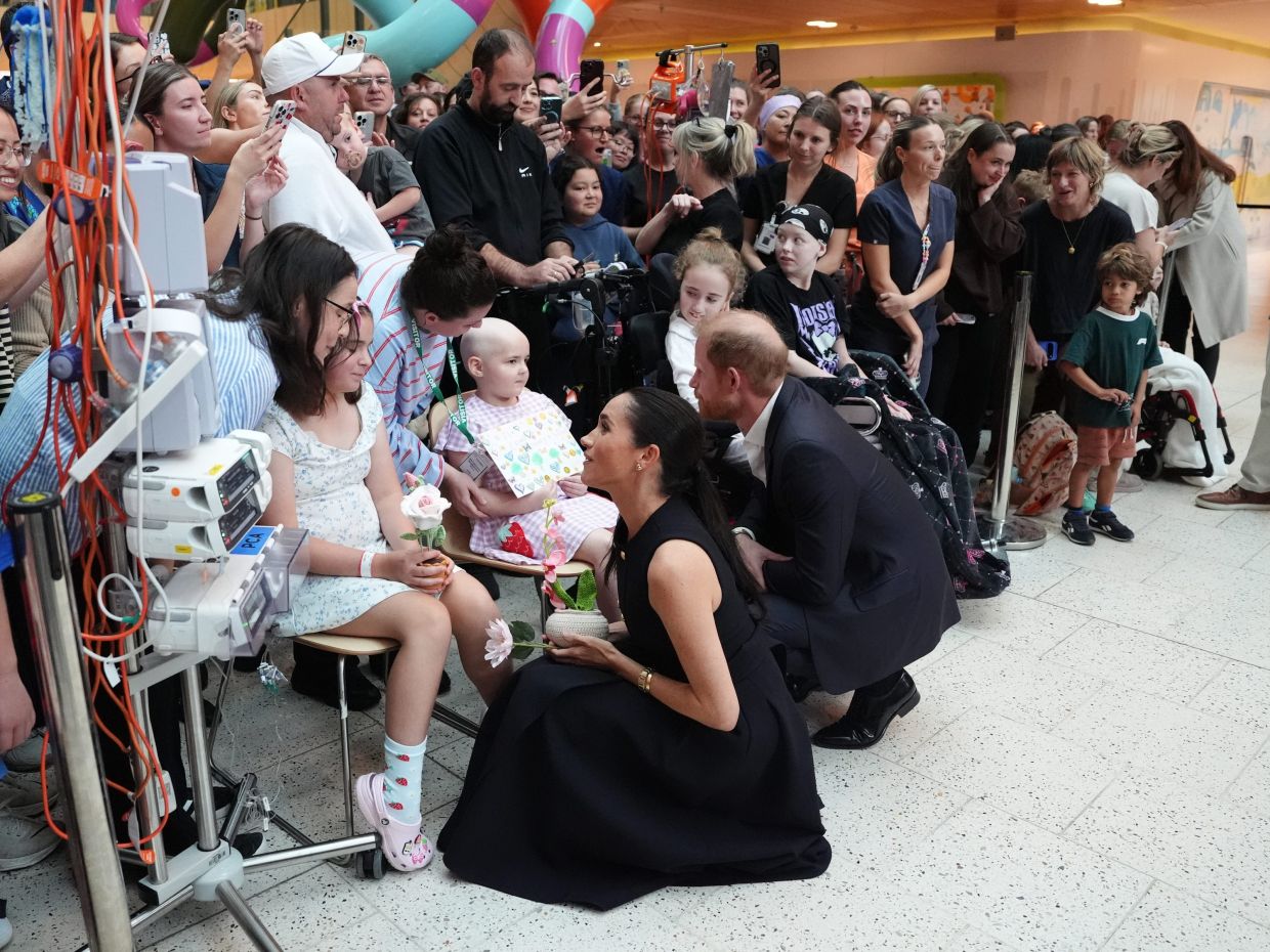 Britain's Prince Harry and Meghan Markle, the Duke and Duchess of Sussex, meet patients and their family members during a visit to the Royal Children's Hospital Melbourne, Australia Tuesday, April 14, 2026. Photo: AP