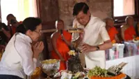 President shares in temple rites as Lao New Year festivities unfold