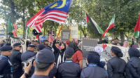 NGOs protest presence of defence firms 'complicit in genocide' at DSA and Natsec Asia