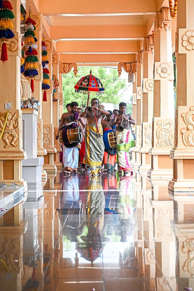 Devotees taking part in a vibrant procession through the temple grounds as they celebrate Puthandu at Sri Sithi Vinayagar Temple in Petaling Jaya, ushering in the Tamil New Year with ritual and festivity. — IZZRAFIQ ALIAS/The Star