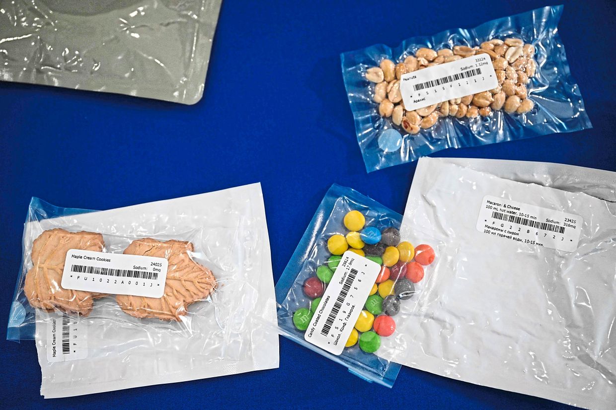A selection of specially prepared meals that sustained the Artemis II crew during their journey in space, offering a glimpse into life aboard the mission. — AFP