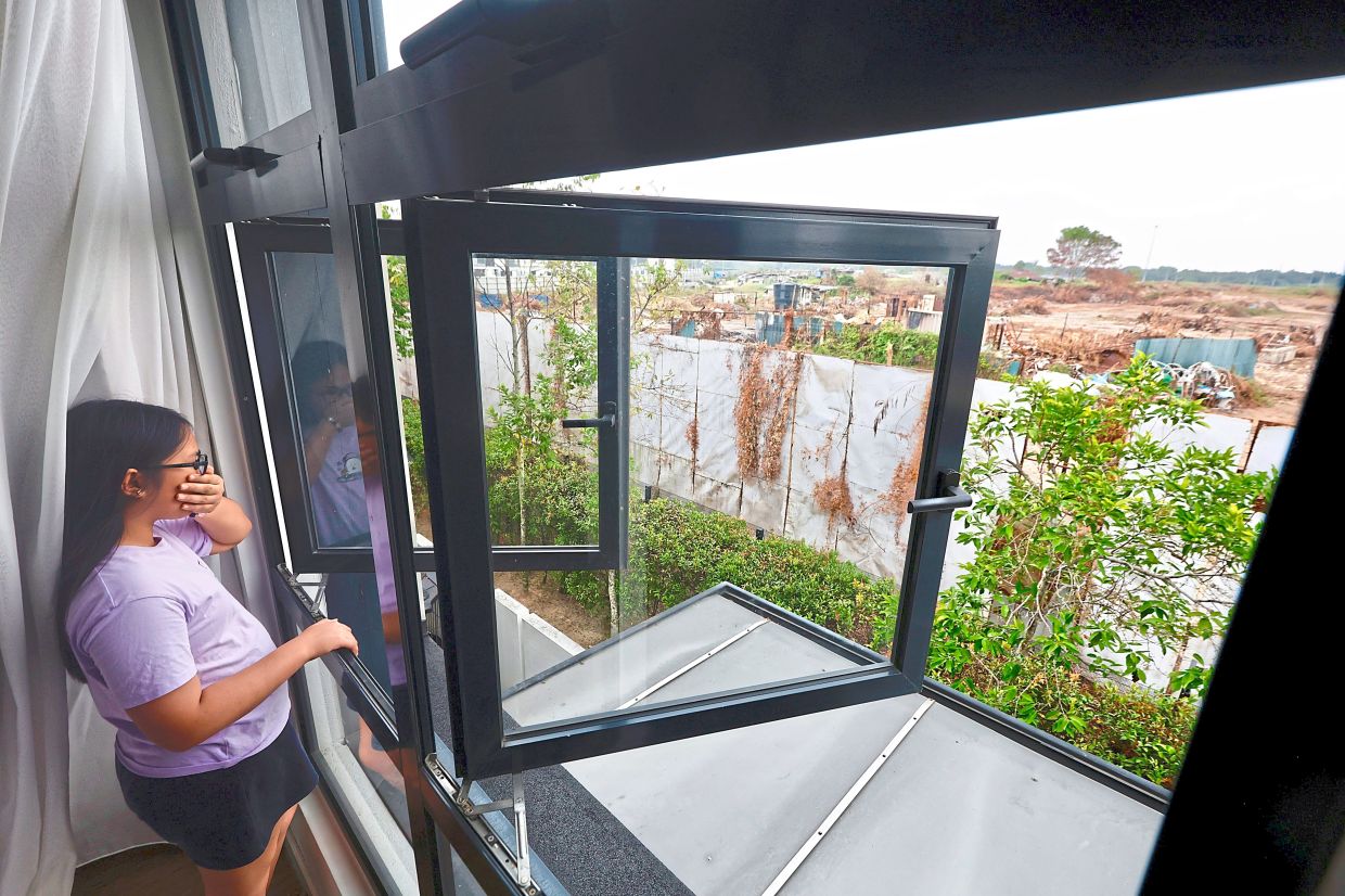 Tropicana Aman Dalia Residences residents are able to see an illegal dumpsite from their windows.