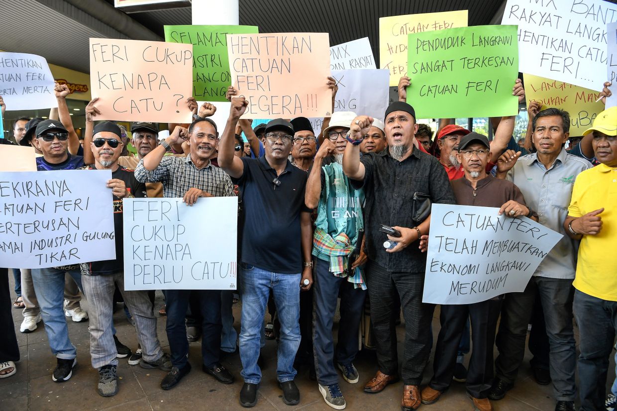 Langkawi ferry service reduction sparks protest