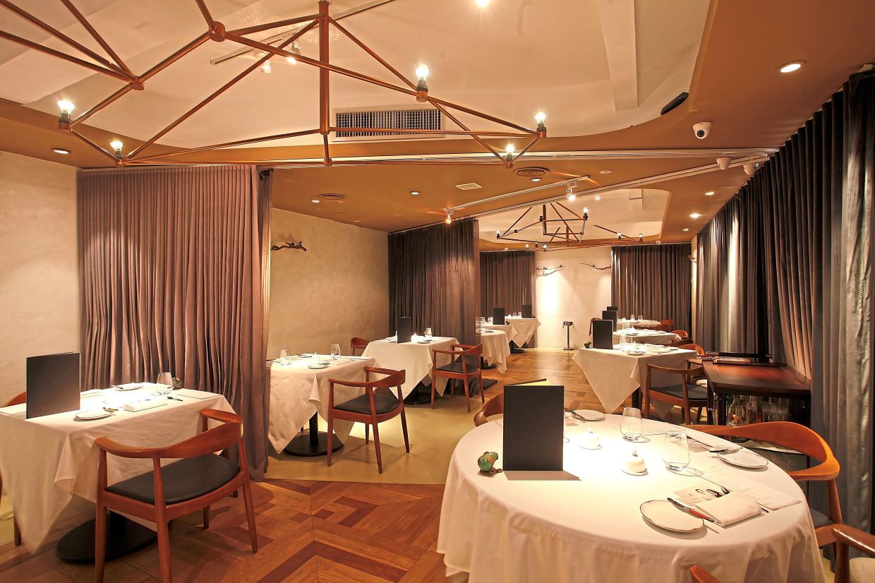 The main dining area is cosmopolitan, sleek and very inviting.