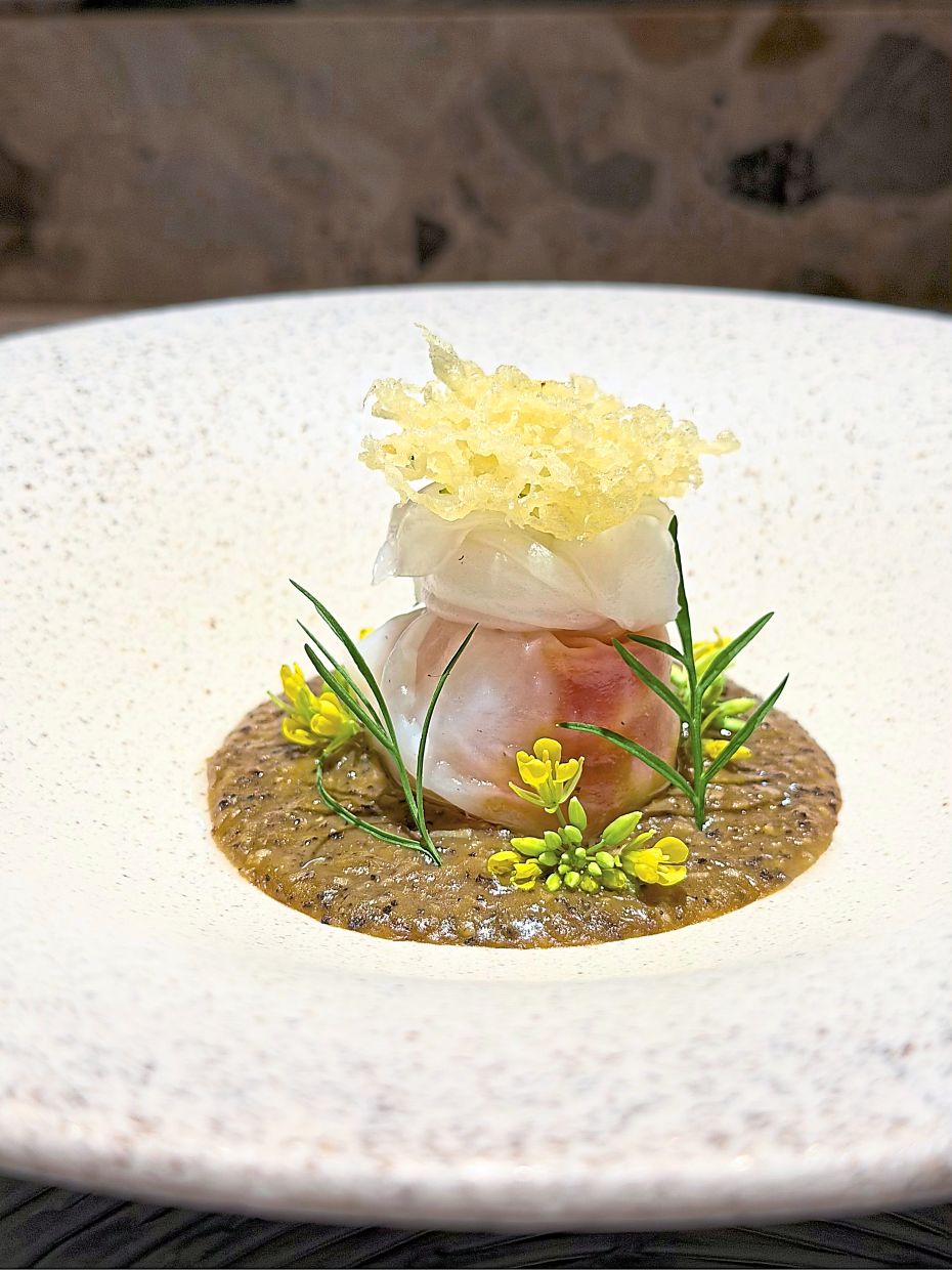 Mud crab and cheong fun with XO sauce and various other elements showcase the calculated, restrained Asian touch in Chin's current menu. — DC Restaurant