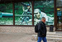 Analysis-Mass shooting reignites push to loosen gun laws in war-torn Ukraine