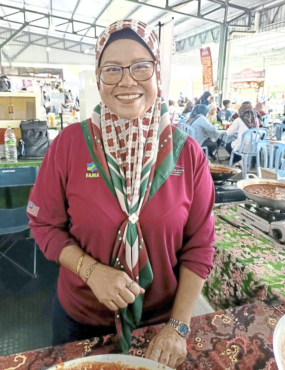 Wan Noraidah looking at other options instead of raising prices at her stall.
