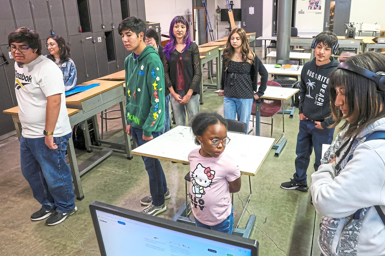 Honey joins her classmates in a design class.