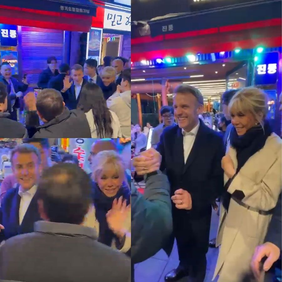 Bonsoir, Seoul: The Macrons greet well-wishers on April 3, 2026 in vibrant Donhwamun-ro, Seoul. Their evening stroll, following a state luncheon with prominent figures from various fields, including Samsung Electronics executive chairman Lee Jae-yong and K-pop stars Stray Kids, highlights the informal side of international relations. PHOTO PROVIDED: JAKUB ŘÍHA, MATIJA STEPIŠNIK