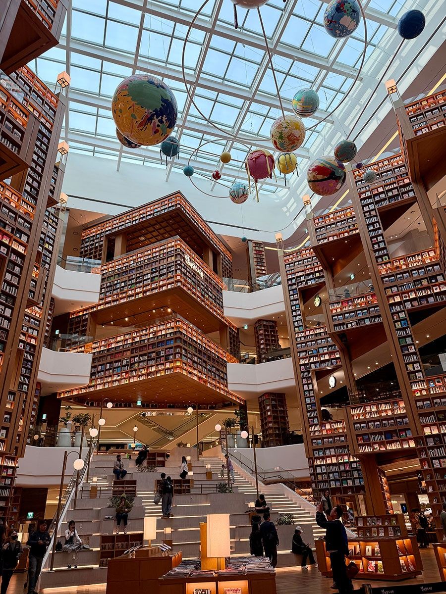 Celestial splendour: Starfield Library, a signature attraction of Starfield Suwon with its 22m-high bookshelves spanning four levels, features ‘The Planets’ installation by artist Douglas Coupland. PHOTO: THE STAR