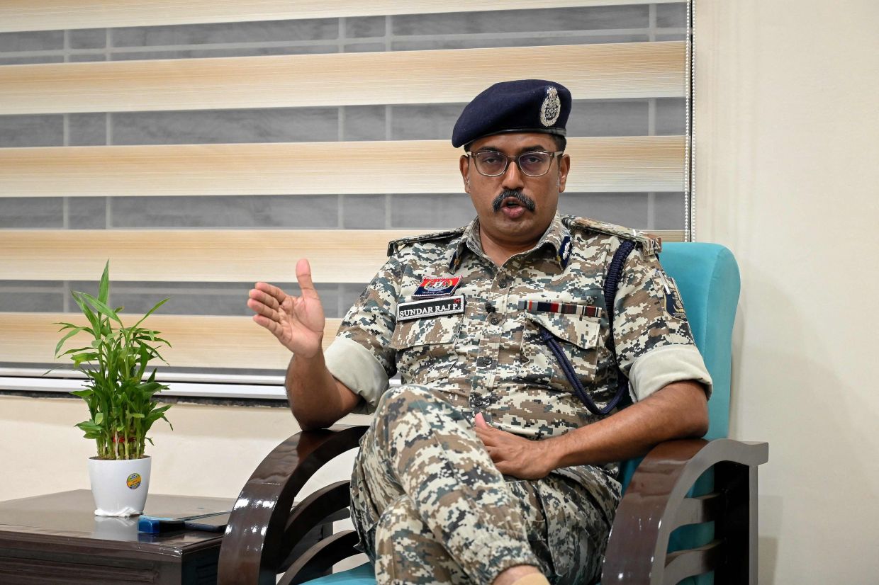 Local police chief Sundarraj P. speaking with AFP during the interview at his office in Chhattisgarh's Jagdalpur. - AFP