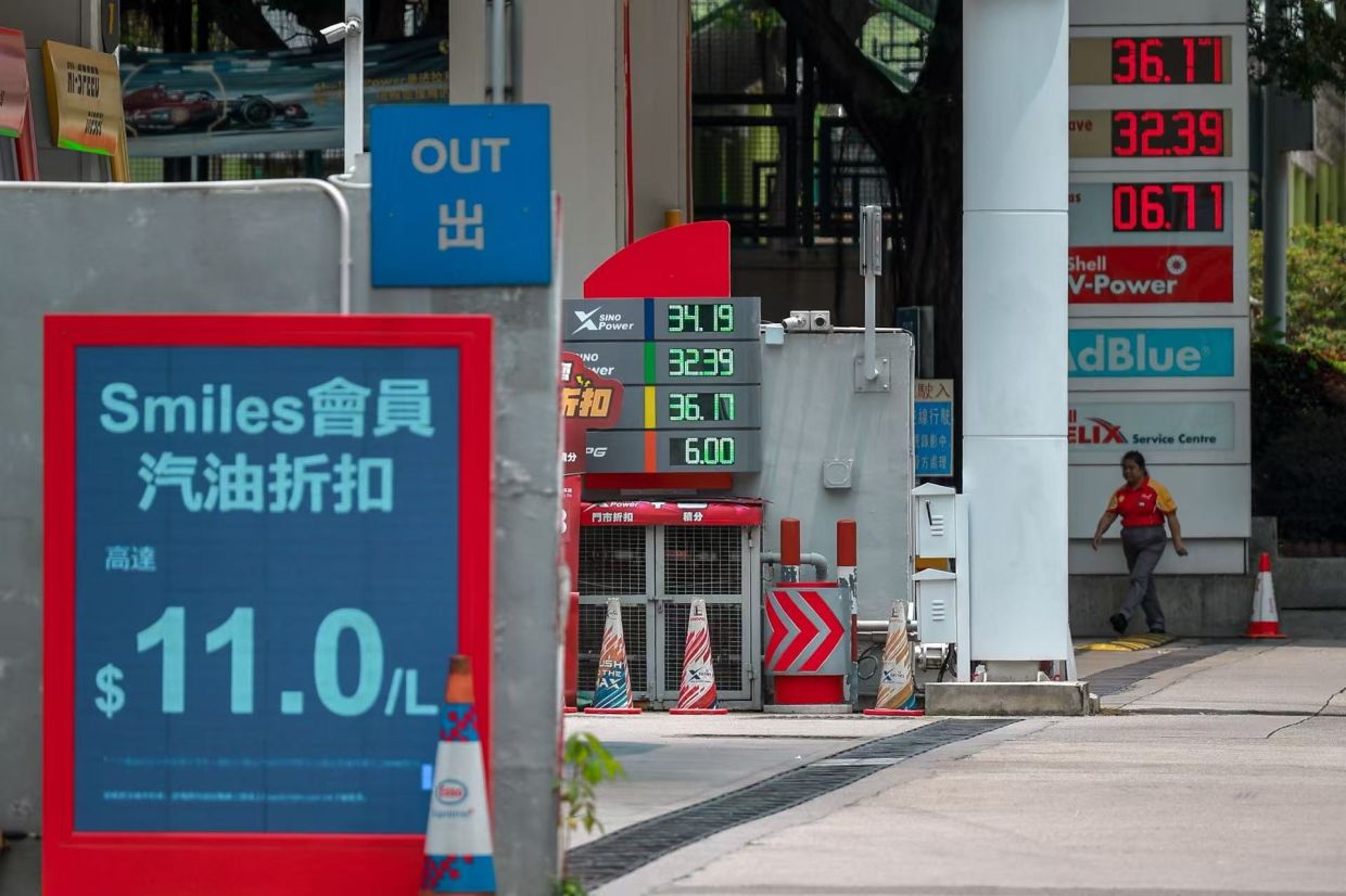 A staff member attends to her job at a petrol station near Tai Wo Hau on April 22, 2026. - Photo: China Daily/ANN