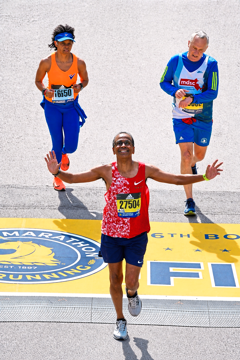 Finishing the Boston Marathon in style, earning the Abbott World Marathon Majors Six Star medal, 2022.