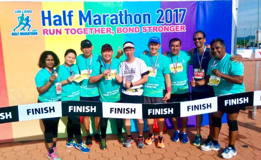 The original group from St Paul’s Institution who mooted the idea in September 2016 to take part in a 10km run the following year.
