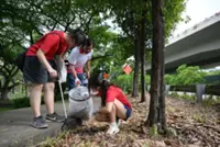 Singapore students join migrant workers for annual beach clean-up