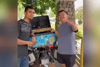 Bike mechanic and single father move Malaysian hearts again