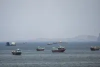 Iran seizes ships in Strait of Hormuz after Trump halts attacks