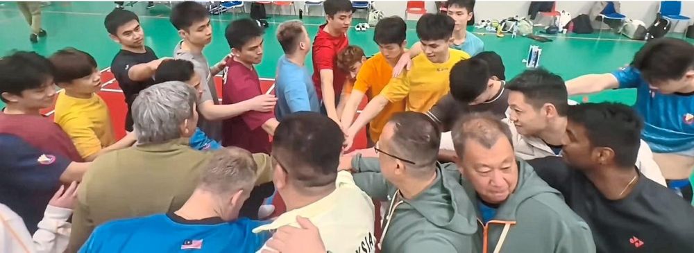 Embrace unity: The national players gather to cheer before starting their training. – Badminton Association of Malaysia