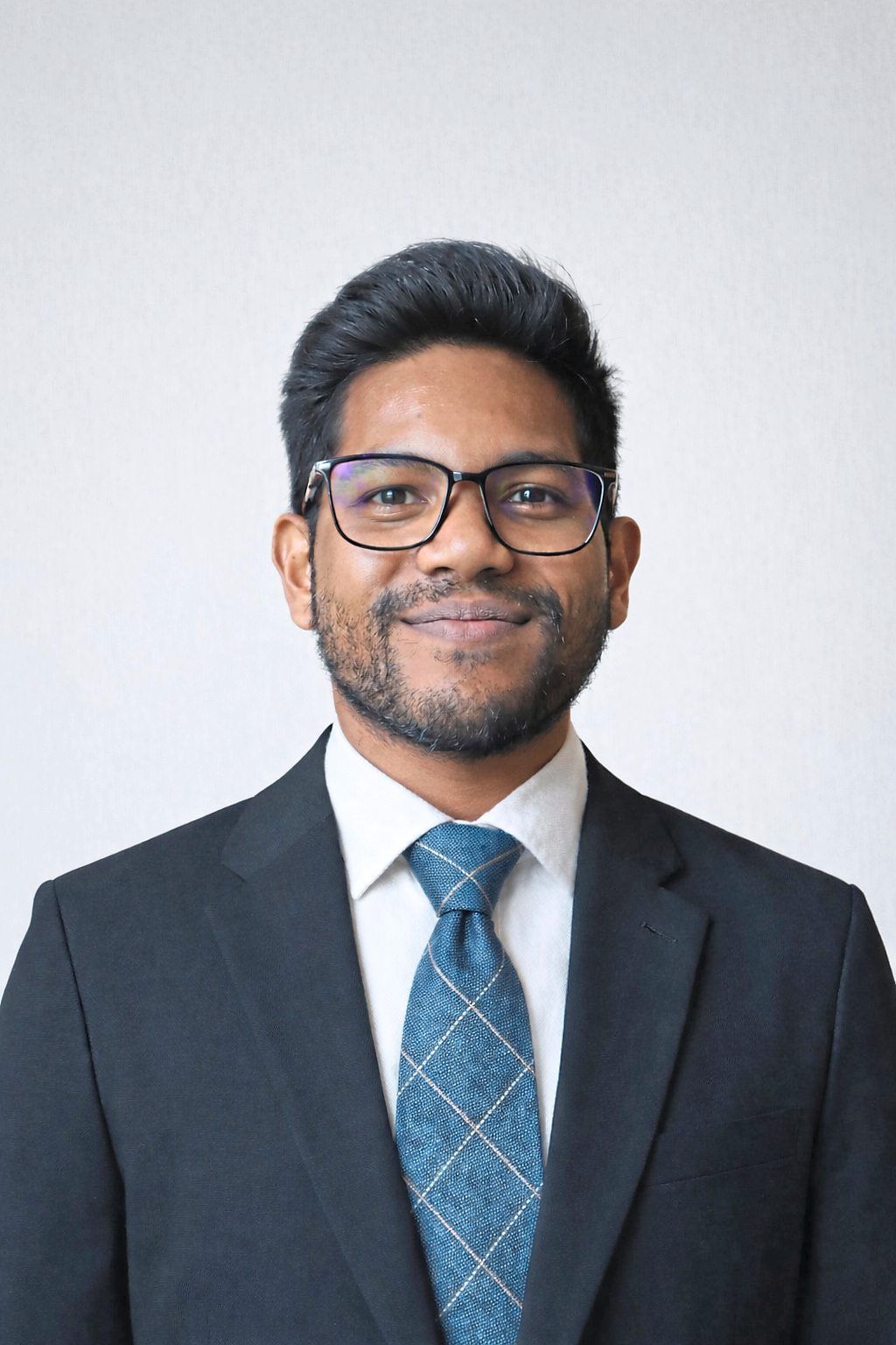 During volatile periods, Muhammad Aizat advises families to make financial changes such as cutting down on non-essential items and saving money. Photo: Muhammad Aizat Zainal Alam