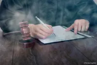 Two charged over offensive Facebook posts