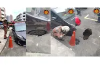 Bomba helps free MPV after tyre gets stuck in sinkhole