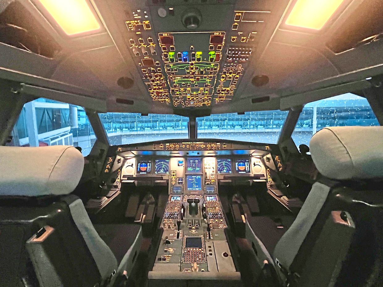 'Flying' the A330neo was part of the immersion experience. — GISELE SOO