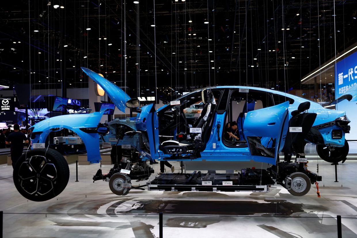 China's auto industry races to embed AI in line with Beijing mandate ...