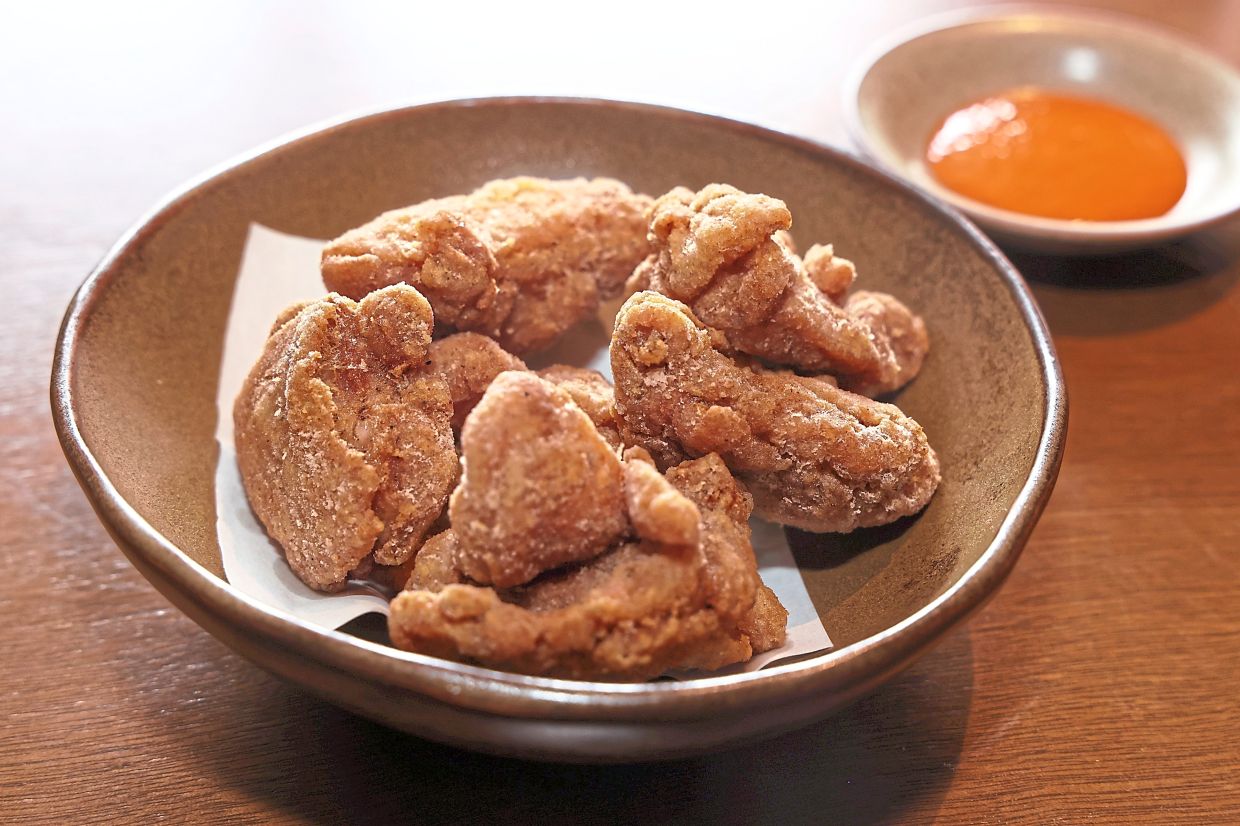 The chicken karaage features satisfying crackly skin that yields to juicy, tender meat.