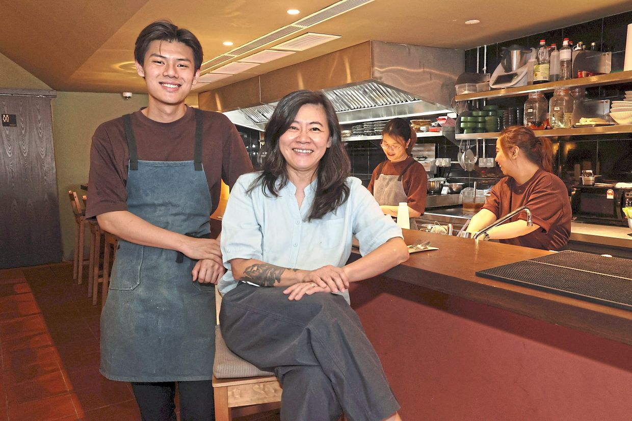 Ong (right) is one of the founders of Tobon Izakaya, which opened a few months ago. Pictured on her left is head chef Choo.