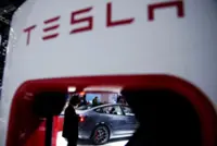 Tesla sharply increases spending plans