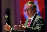 Mexico opens probe into economy minister over son's stay in diplomatic residence