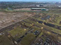 Powered land and zombie projects: Real estate in the age of AI