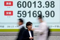 Japan's Nikkei closes at record high as tech earnings overshadow Mideast concerns
