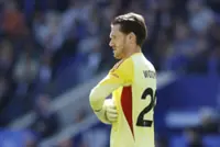 Soccer-Woodman in contention as Slot faces Liverpool goalkeeper shortage