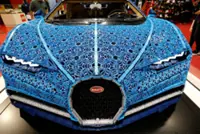 Porsche sells stake in sportscar maker Bugatti