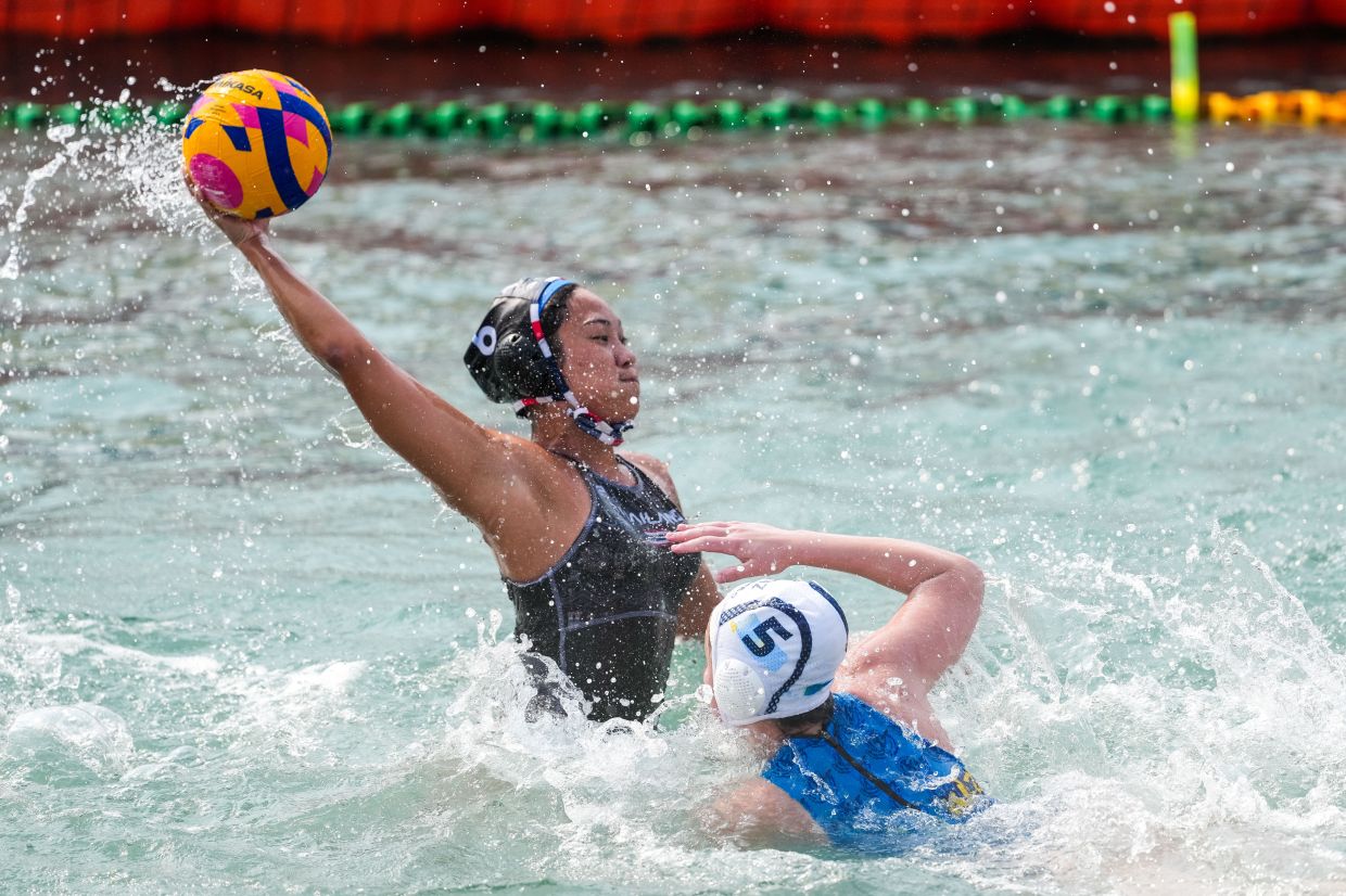 Water polo players in action. The 6th Asian Beach Games highlight both sporting competition and the broader transformation of the island.