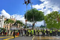 Tussle breaks out between protesters, cops at rally after Rafizi briefly led away