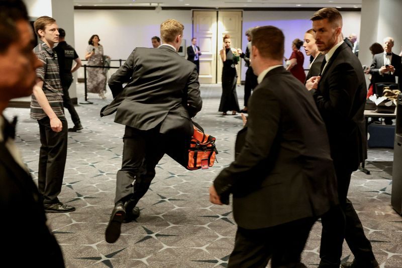 Hundreds of agents from several law ‌enforcement agencies were tasked with protecting the annual bash, yet a suspect with weapons managed to get on to just a floor above the ballroom.