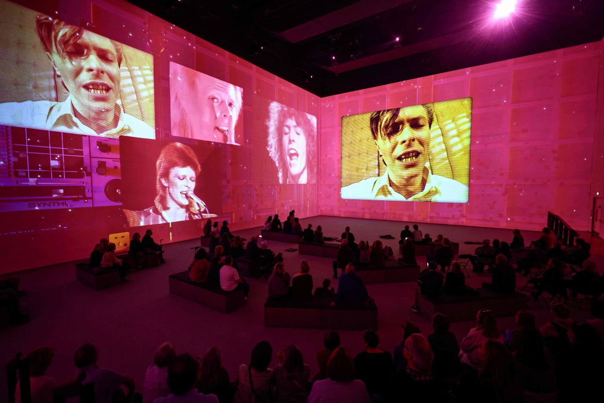 The multimedia show presents Bowie in performance, featuring previously unseen footage alongside rare interview recordings. Photo: AFP 