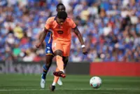 Soccer-Barcelona march on towards title with 2-0 victory at Getafe