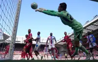 Soccer-Liverpool edge closer to Champions League but Salah injury clouds Palace win